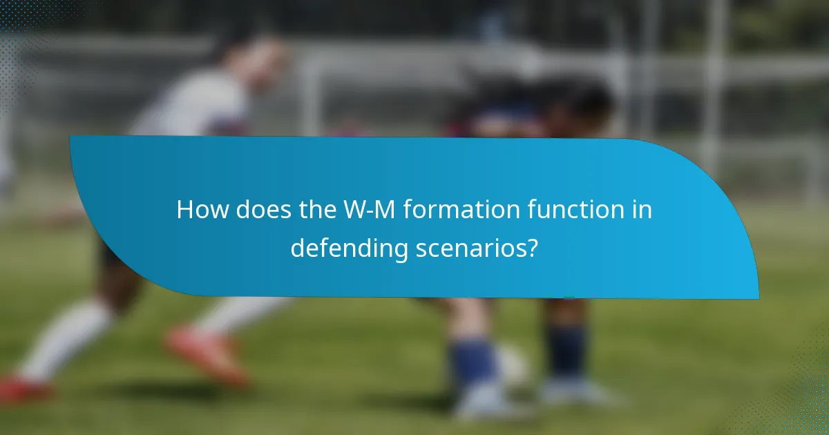 How does the W-M formation function in defending scenarios?
